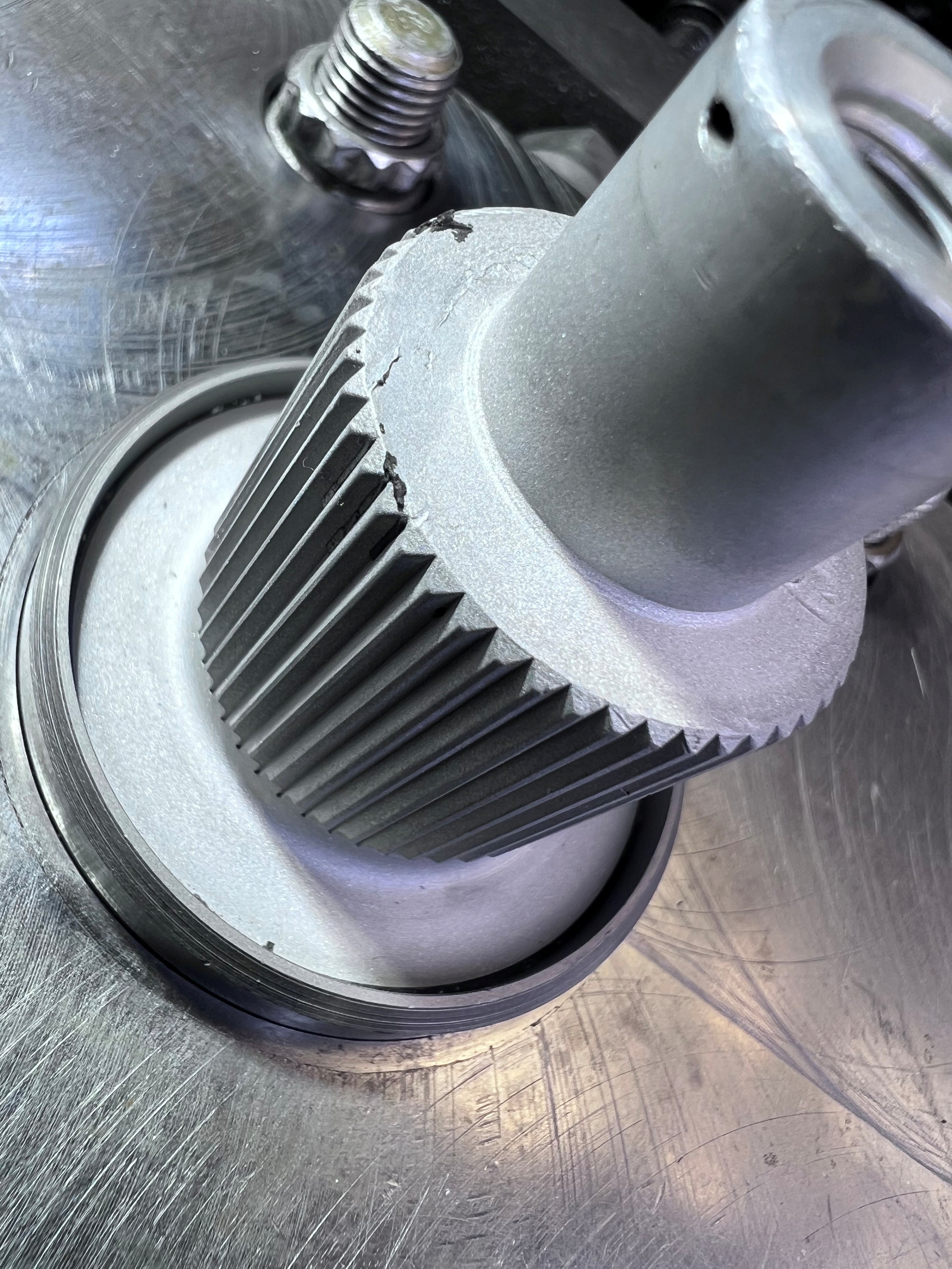 Machined-off TR-182 landing-gear pivot assembly showing cracked bore detail